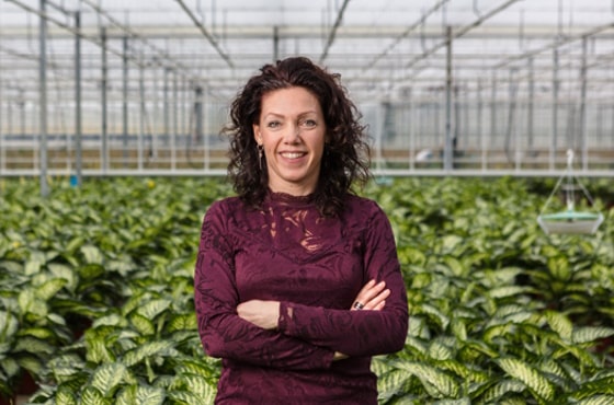 Picture of Joyce van der Burg in greenhouse